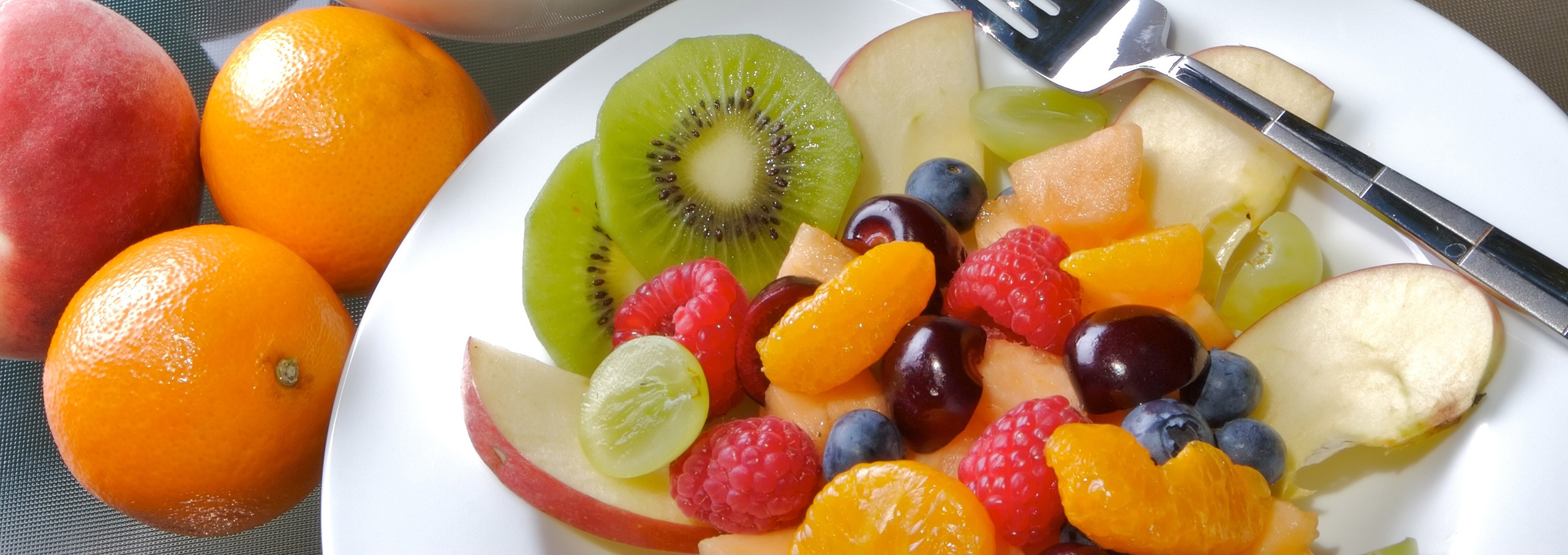 Header image plate of fruit and about us heading